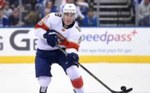 Florida Panthers forward Reilly smith (18) shoots the puck into the Toronto Maple Leafs zone (Dan Hamilton-USA TODAY Sports)