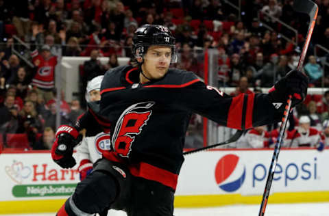 RALEIGH, NC – DECEMBER 31: Sebastian Aho #20 of the Carolina Hurricanes celebrates after scoring a goal during an NHL game against the Montreal Canadiens on December 31, 2019 at PNC Arena in Raleigh, North Carolina. (Photo by Gregg Forwerck/NHLI via Getty Images)