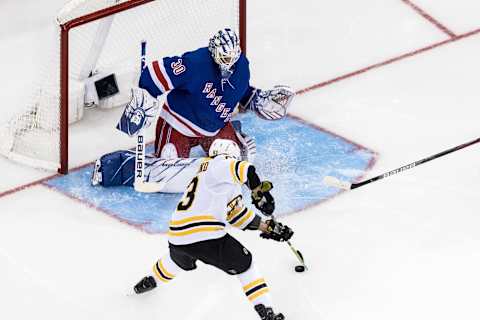 NEW YORK, NY – OCTOBER 27: Boston Bruins Left Wing Brad Marchand (63) works in front of New York Rangers Goalie Henrik Lundqvist (30) during an Eastern Conference matchup between the Boston Bruins and the New York Rangers on October 27, 2019, at Madison Square Garden in New York, NY. (Photo by David Hahn/Icon Sportswire via Getty Images)