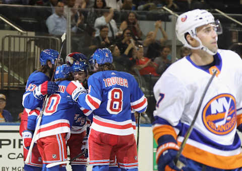 NEW YORK, NEW YORK – SEPTEMBER 24: The New York Rangers celebrate a second period goal by Artemi Panarin #10 against the New York Islanders at Madison Square Garden on September 24, 2019 in New York City. (Photo by Bruce Bennett/Getty Images)