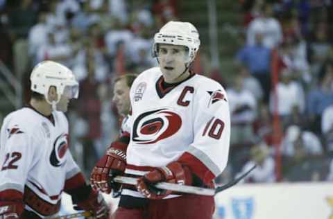 RALEIGH, NC – JUNE 10: Center Ron Francis #10 of the Carolina Hurricanes looks on against the Detroit Red Wings during game four of the NHL Stanley Cup Finals at the Entertainment Sports Arena in Raleigh, North Carolina on June 10, 2002. The Red Wings defeated the Hurricanes 3-0. (Photo by Elsa/Getty Images/NHLI)