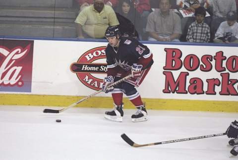 25 Apr 1997: Right wing Russ Courtnall of the New York Rangers skates down the ice during a playoff game against the Florida Panthers at the Miami Arena in Miami, Florida. The Rangers won the game 3-2. Mandatory Credit: Andy Lyons /Allsport