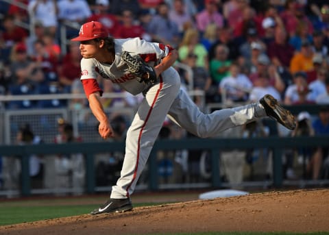 Omaha, NE – JUNE 26: pitcher Blaine Knnight #16 of the Arkansas Razorbacks delivers a picth in the first third against the Oregon State Beavers during game one of the College World Series Championship Series on June 26, 2018 at TD Ameritrade Park in Omaha, Nebraska. (Photo by Peter Aiken/Getty Images)