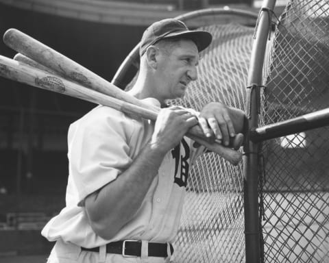 BOSTON, MA – SEPTEMBER 18: Ernie Lombardi, the “Big Bomber” of the Boston Braves is shouldering a couple of 46-ounce baseball bats while waiting for his turn in the batting cage on September 18, 1942, in Boston, Massachusetts. (Photo by The Stanley Weston Archive/Getty Images)