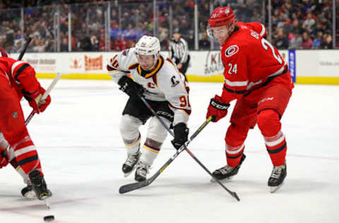 CLEVELAND, OH – NOVEMBER 03: Cleveland Monsters left wing Nathan Gerbe (90) and Charlotte Checkers defenceman Jake Bean (24) chase the puck during the second period of the American Hockey League game between the Charlotte Checkers and Cleveland Monsters on November 3, 2019, at Rocket Mortgage FieldHouse in Cleveland, OH.(Photo by Frank Jansky/Icon Sportswire via Getty Images)