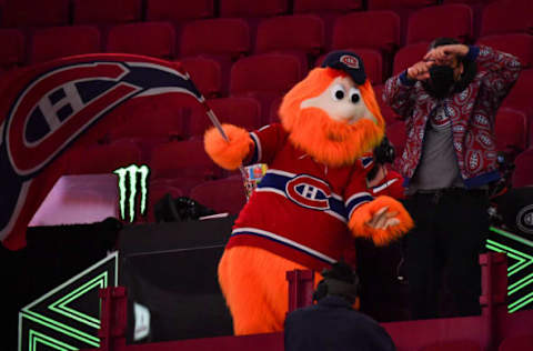 MONTREAL, QC – FEBRUARY 17: Montreal Canadiens’ mascot Youppi!, waves a flag during the third period against the St. Louis Blues at Centre Bell on February 17, 2022 in Montreal, Canada. (Photo by Minas Panagiotakis/Getty Images)