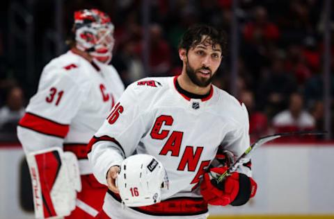 WASHINGTON, DC – MARCH 28: Vincent Trocheck #16 of the Carolina Hurricanes retrieves his helmet after a play against the Washington Capitals during the second period of the game at Capital One Arena in March 28, 2022, in Washington, DC. (Photo by Scott Taetsch/Getty Images)