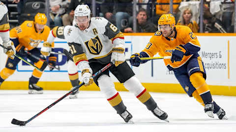 NASHVILLE, TN – FEBRUARY 1: Mark Stone #61 of the Vegas Golden Knights skates against Rocco Grimaldi #23 of the Nashville Predators at Bridgestone Arena on February 1, 2020 in Nashville, Tennessee. (Photo by John Russell/NHLI via Getty Images)