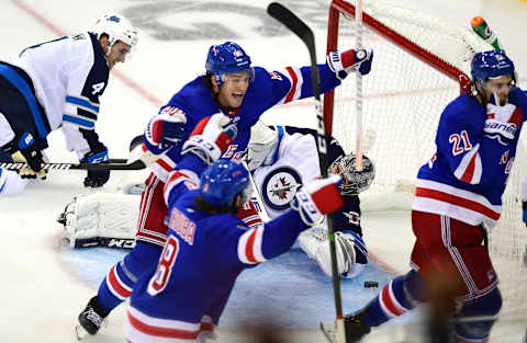 NEW YORK, NEW YORK – OCTOBER 03: Brendan Lemieux #48, Jacob Trouba #8 and Brett Howden #21 of the New York Rangers celebrate a goal by Howden in the third period of their game against the Winnipeg Jets at Madison Square Garden on October 03, 2019 in New York City. (Photo by Emilee Chinn/Getty Images)