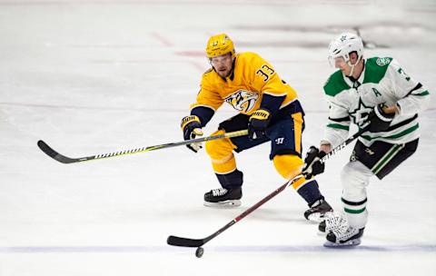 NASHVILLE, TN – FEBRUARY 02: John Klingberg #3 of the Dallas Stars skates against Viktor Arvidsson #33 of the Nashville Predators during a NHL game at Bridgestone Arena on February 2, 2019 in Nashville, Tennessee. (Photo by Ronald C. Modra/NHL/Getty Images)