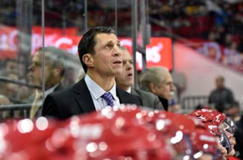 RALEIGH, NORTH CAROLINA – DECEMBER 22: Head coach Rod Brind’Amour of the Carolina Hurricanes watches his team play against the Pittsburgh Penguins during their game at PNC Arena on December 22, 2018 in Raleigh, North Carolina. (Photo by Grant Halverson/Getty Images)