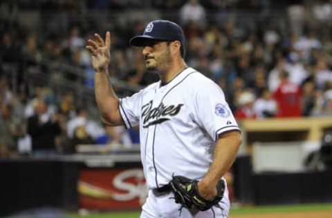 SAN DIEGO, CA – JUNE 10: Jason Marquis #21 of the San Diego Padres waves to the fans as he leaves the game in the eighth inning of a baseball game against the Atlanta Braves at Petco Park on June 10, 2013 in San Diego, California. (Photo by Denis Poroy/Getty Images)