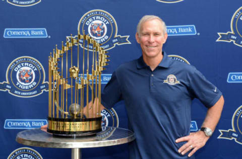 DETROIT, MI – JUNE 30: Former Detroit Tigers shortstop Alan Trammell poses for a photo with the 1984 World Championship trophy prior to the game against the Oakland Athletics at Comerica Park on June 30, 2014 in Detroit, Michigan. The Tigers defeated the A’s 5-4. (Photo by Mark Cunningham/MLB Photos via Getty Images)