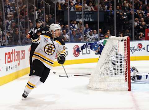 TORONTO, ONTARIO – NOVEMBER 15: Skating in his 700th NHL game, Brad Marchand #63 of the Boston Bruins scores the game winning goal at 5:08 of the third period against the Toronto Maple Leafs at the Scotiabank Arena on November 15, 2019 in Toronto, Ontario, Canada. The Bruins defeated the Maple Leafs 4-2. (Photo by Bruce Bennett/Getty Images)