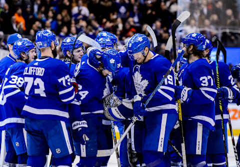 TORONTO, ON – FEBRUARY 11: Kasperi Kapanen #24 of the Toronto Maple Leafs celebrates with team-mate Jason Spezza #19   (Photo by Andrew Lahodynskyj/NHLI via Getty Images)