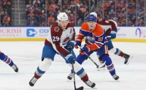 EDMONTON, CANADA – JANUARY 7: Nathan Mackinnon #29 of the Colorado Avalanche skates with the puck in the first period Ryan Nugent-Hopkins #93 of the Edmonton Oilers in pursuit on January 7, 2023, at Rogers Place in Edmonton, Alberta, Canada. (Photo by Lawrence Scott/Getty Images)