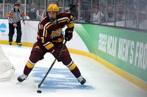 BOSTON, MASSACHUSETTS – APRIL 07: Aaron Huglen #7 of the Minnesota Gophers skates against the Minnesota State Mavericks during the second period of the Frozen Four semifinal at TD Garden on April 07, 2022 in Boston, Massachusetts. (Photo by Maddie Meyer/Getty Images)