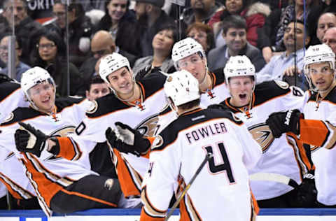 NHL Power Rankings: Anaheim Ducks defenceman Cam Fowler (4) celebrates with teammates on the bench after scoring the game winning goal against the Toronto Maple Leafs 3-2 at Air Canada Centre. Mandatory Credit: Dan Hamilton-USA TODAY Sports