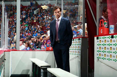 VANCOUVER, BC – OCTOBER 11: Head coach Dallas Eakins of the Edmonton Oilers looks on from the bench during their NHL game against the Vancouver Canucks at Rogers Arena October 11, 2014, in Vancouver, British Columbia, Canada. Vancouver won 5-4 in a shootout. (Photo by Jeff Vinnick/NHLI via Getty Images)