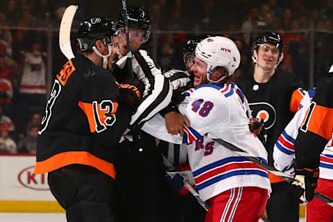 PHILADELPHIA, PA – DECEMBER 23: Kevin Hayes #13 of the Philadelphia Flyers gets in an altercation with Brendan Lemieux #48 of the New York Rangers in the third period at the Wells Fargo Center on December 23, 2019 in Philadelphia, Pennsylvania. The Flyers defeated the Rangers 5-1. (Photo by Mitchell Leff/Getty Images)