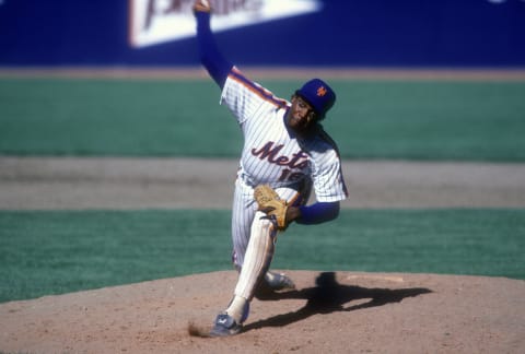 NEW YORK – CIRCA 1987: Dwight Gooden #16 of the New York Mets pitches during a Major League Baseball game circa 1987 at Shea Stadium in the Queens borough of New York City. Gooden played for the Mets from 1984-94. (Photo by Focus on Sport/Getty Images)