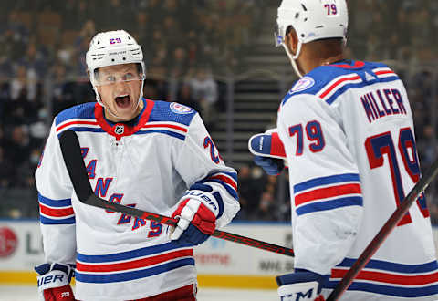 Dryden Hunt #29 of the New York Rangers celebrates a goal with teammate K’Andre Miller #79 (Photo by Claus Andersen/Getty Images)