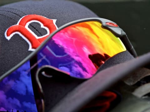 Mar 9, 2015; Jupiter, FL, USA; A detail view of Boston Red Sox baseball cap and sunglasses in the dugout during a spring training baseball game against the St. Louis Cardinals at Roger Dean Stadium. Mandatory Credit: Steve Mitchell-USA TODAY Sports