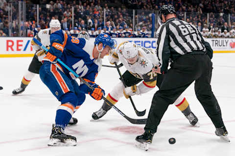 UNIONDALE, NY – DECEMBER 05: New York Islanders Center Brock Nelson (29) and Vegas Golden Knights Center William Karlsson (71) face off during the overtime period of the National Hockey League game between the Las Vegas Golden Knights and the New York Islanders on December 5, 2019, at the Nassau Veterans Memorial Coliseum in Uniondale, NY. (Photo by Gregory Fisher/Icon Sportswire via Getty Images)