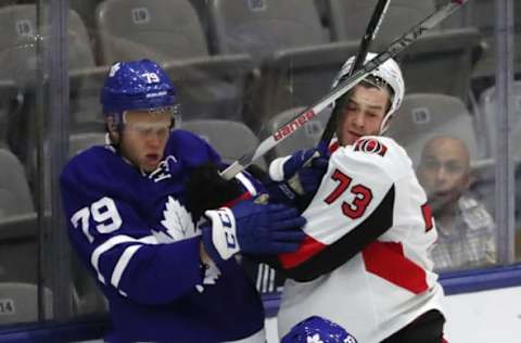 TORONTO, ON- SEPTEMBER 10 – Eemeli Rasanen is checked by Bobby Dow as the the Toronto Maple Leafs Rookie team plays the Ottawa Senators Rookies in the 2017 Rookie Tournament at Ricoh Coliseum in Toronto. September 10, 2017. (Steve Russell/Toronto Star via Getty Images)