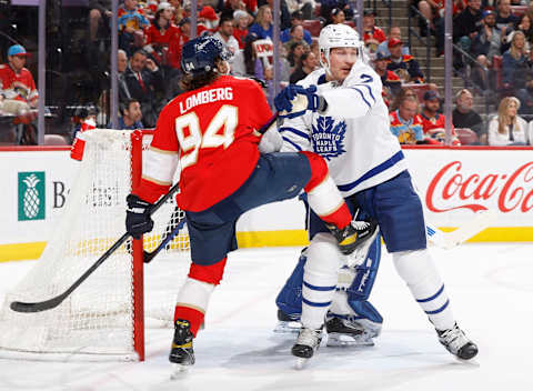 SUNRISE, FL – APRIL 10: Luke Schenn #2 of the Toronto Maple Leafs defends against Ryan Lomberg #94 of the Florida Panthers at the FLA Live Arena on April 10, 2023 in Sunrise, Florida. (Photo by Joel Auerbach/Getty Images)