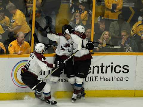 NASHVILLE, TN – APRIL 20: Colorado Avalanche defenseman Mark Barberio #44 and Colorado Avalanche left wing Gabriel Bourque #57 celebrate with teammate Colorado Avalanche right wing Sven Andrighetto #10 after Andrighetto scored the game winning goal against Nashville Predators goaltender Pekka Rinne #35 in the third period of game 5 of round one of the Stanley Cup Playoffs at Bridgestone Arena April 20, 2018. The Avalanche won 2-1. (Photo by Andy Cross/The Denver Post via Getty Images)