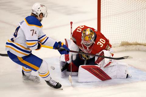 Dec 2, 2021; Sunrise, Florida, USA; Florida Panthers goaltender Spencer Knight (30) blocks the shot of Buffalo Sabres right wing Rasmus Asplund (74) during the third period at FLA Live Arena. Mandatory Credit: Jasen Vinlove-USA TODAY Sports