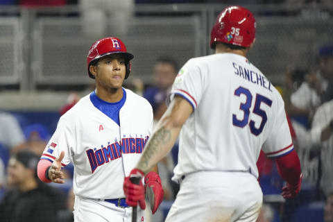 Jeremy Pena  is congratulated by Gary Sanchez after scoring in the seventh inning against Israel at loanDepot park. (Photo by Eric Espada/Getty Images)