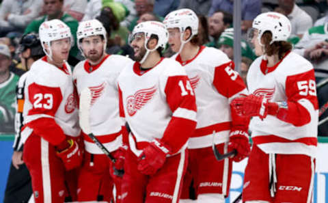 DALLAS, TEXAS – NOVEMBER 16: Dylan Larkin #71 of the Detroit Red Wings celebrates with Lucas Raymond #23 of the Detroit Red Wings, Robby Fabbri #14 of the Detroit Red Wings, Moritz Seider #53 of the Detroit Red Wings and Tyler Bertuzzi #59 of the Detroit Red Wings after scoring a goal against the Dallas Stars in the second period at American Airlines Center on November 16, 2021 in Dallas, Texas. (Photo by Tom Pennington/Getty Images)