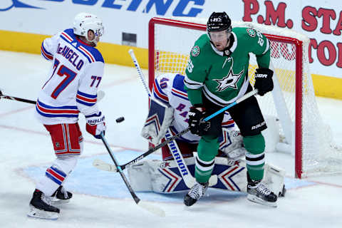 DALLAS, TEXAS – MARCH 05: Brett Ritchie #25 of the Dallas Stars assists on a goal against Alexandar Georgiev #40 of the New York Rangers as Tony DeAngelo #77 of the New York Rangers defends in the second period at American Airlines Center on March 05, 2019 in Dallas, Texas. (Photo by Tom Pennington/Getty Images)