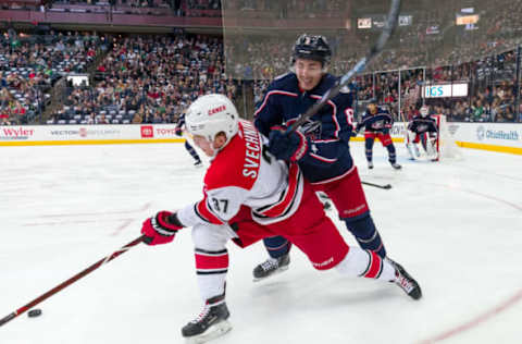 COLUMBUS, OH – MARCH 15: Carolina Hurricanes right wing Andrei Svechnikov (37) battles with Columbus Blue Jackets defenseman Zach Werenski (8) in a game between the Columbus Blue Jackets and the Carolina Hurricanes on March 15, 2019 at Nationwide Arena in Columbus, OH. (Photo by Adam Lacy/Icon Sportswire via Getty Images)