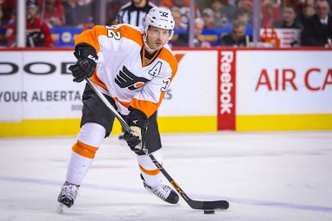 Nov 5, 2015; Calgary, Alberta, CAN; Philadelphia Flyers defenseman Mark Streit (32) controls the puck against the Calgary Flames during the first period at Scotiabank Saddledome. Calgary Flames won 2-1. Mandatory Credit: Sergei Belski-USA TODAY Sports