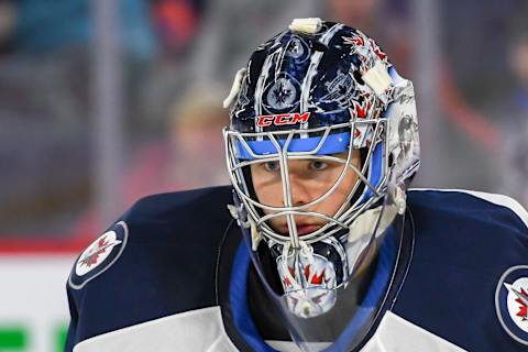 LAVAL, QC, CANADA – FEBRUARY 22: Close-up of Eric Comrie of the Manitoba Moose against the Laval Rocket at Place Bell on February 22, 2019 in Laval, Quebec. (Photo by Stephane Dube/Getty Images)