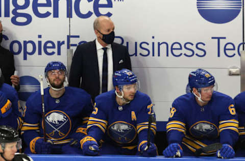 Jan 14, 2021; Buffalo, New York, USA; Buffalo Sabres head coach Ralph Krueger watches from the bench during the second period against the Washington Capitals at KeyBank Center. Mandatory Credit: Timothy T. Ludwig-USA TODAY Sports