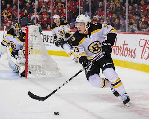 CALGARY, AB – FEBRUARY 21: Charlie McAvoy #73 of the Boston Bruins in action against the Calgary Flames during an NHL game at Scotiabank Saddledome on February 21, 2020 in Calgary, Alberta, Canada. (Photo by Derek Leung/Getty Images)