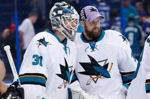 TAMPA, FL – NOVEMBER 12: Goalies Martin Jones #31 and Aaron Dell #30 of the San Jose Sharks celebrate the win against the Tampa Bay Lightning at Amalie Arena on November 12, 2016 in Tampa, Florida. (Photo by Scott Audette/NHLI via Getty Images)