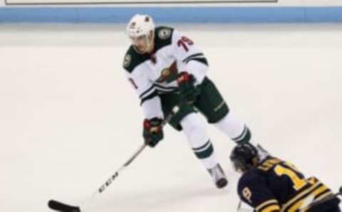 Sep 26, 2016; State College, PA, USA; Minnesota Wild defensemen Hunter Warner (79) handles the puck during the third period against the Buffalo Sabres during a preseason hockey game at Pegula Ice Arena. The Wild defeated the Sabres 2-1. Mandatory Credit: Matthew O