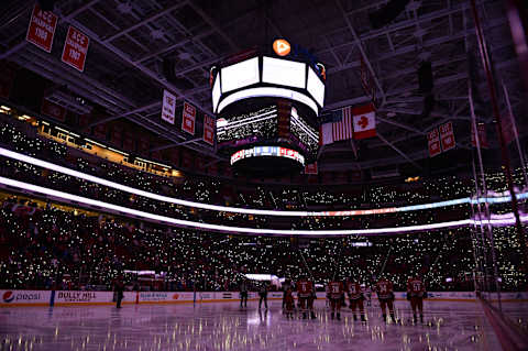 RALEIGH, NC – NOVEMBER 22: Carolina Hurricanes fans lights the arena in honor of Hockey Fights Cancer during a game between the Carolina Hurricanes and the New York Rangers at the PNC Arena in Raleigh, NC on November 22, 2017. (Photo by Greg Thompson/Icon Sportswire via Getty Images)