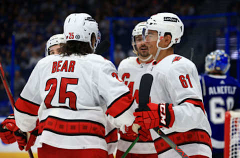 TAMPA, FLORIDA – OCTOBER 01: Ryan Suzuki #61 of the Carolina Hurricanes celebrates a goal during a preseason game against the Tampa Bay Lightning at Amalie Arena on October 01, 2021, in Tampa, Florida. (Photo by Mike Ehrmann/Getty Images)