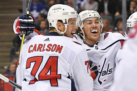 TORONTO, ON – OCTOBER 29: Washington Capitals Defenceman John Carlson (74) and Right Wing T.J. Oshie (77) celebrate a third period goal during the regular season NHL game between the Washington Capitals and Toronto Maple Leafs on October 29, 2019 at Scotiabank Arena (Photo by Gerry Angus/Icon Sportswire via Getty Images)