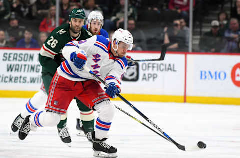 ST. PAUL, MN – FEBRUARY 13: New York Rangers Left Wing Michael Grabner (40) dumps the puck into the zone during an NHL game between the Minnesota Wild and New York Rangers on February 13, 2018, at Xcel Energy Center in St. Paul, MN. The Wild defeated the Rangers 3-2.(Photo by Nick Wosika/Icon Sportswire via Getty Images)