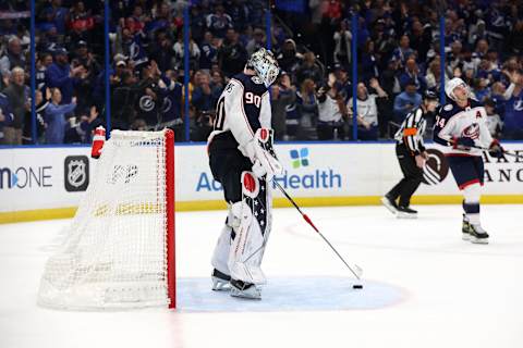 Jan 10, 2023; Tampa, Florida, USA; Columbus Blue Jackets goaltender Elvis Merzlikins (90) looks down after giving up a goal to Tampa Bay Lightning during the third period at Amalie Arena. Mandatory Credit: Kim Klement-USA TODAY Sports