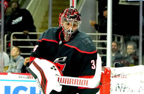 RALEIGH, NC – OCTOBER 11: Petr Mrazek #34 of the Carolina Hurricanes taps the pipes celebrating a victory over the New York Islanders during an NHL game on October 11, 2019 at PNC Arena in Raleigh North Carolina. (Photo by Gregg Forwerck/NHLI via Getty Images)