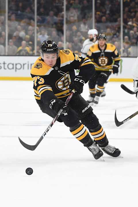 BOSTON, MA – DECEMBER 17: Charlie McAvoy #73 of the Boston Bruins skates with the puck against the Los Angeles Kings at the TD Garden on December 17, 2019 in Boston, Massachusetts. (Photo by Steve Babineau/NHLI via Getty Images)