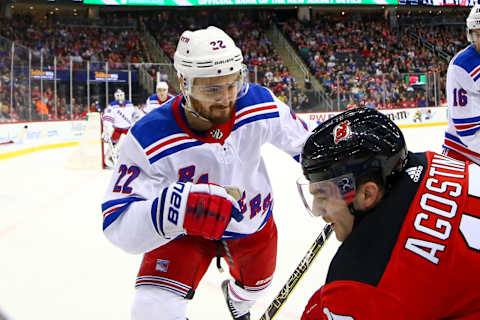 NEWARK, NJ – APRIL 01: New York Rangers defenseman Kevin Shattenkirk (22) battles with New Jersey Devils left wing Kenny Agostino (17) during the National Hockey League game between the New Jersey Devils and the New York Rangers on April 1, 2019 at the Prudential Center in Newark, NJ. (Photo by Rich Graessle/Icon Sportswire via Getty Images)